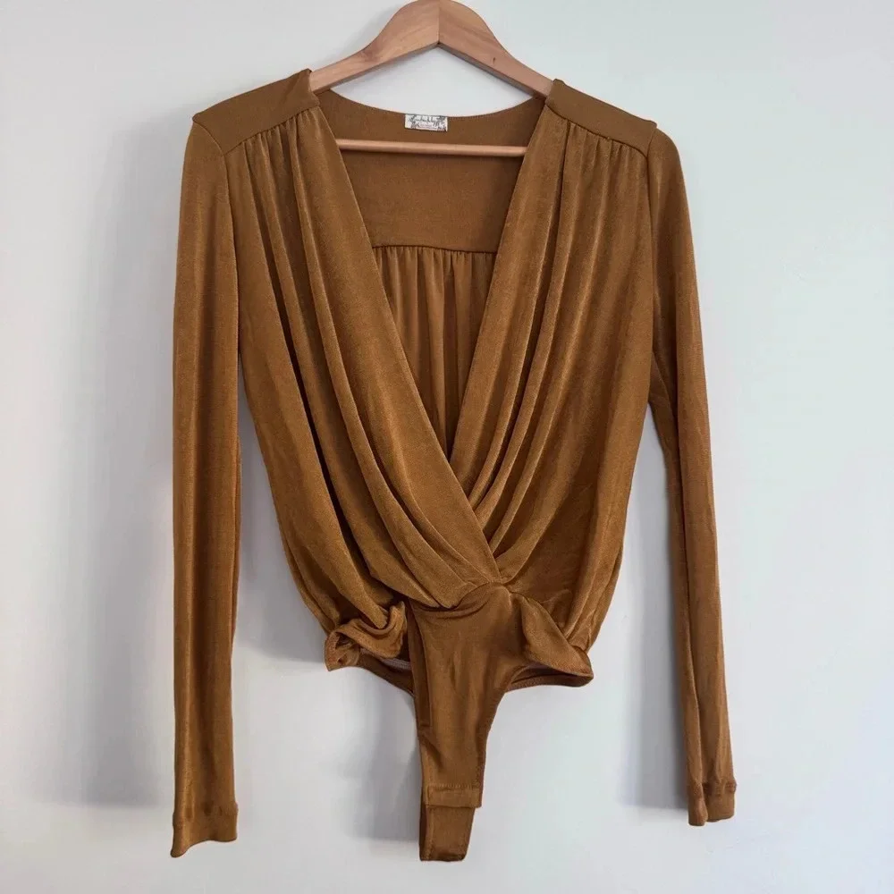 Free People Turnt Bodysuit in Honey Ginger Size: XS